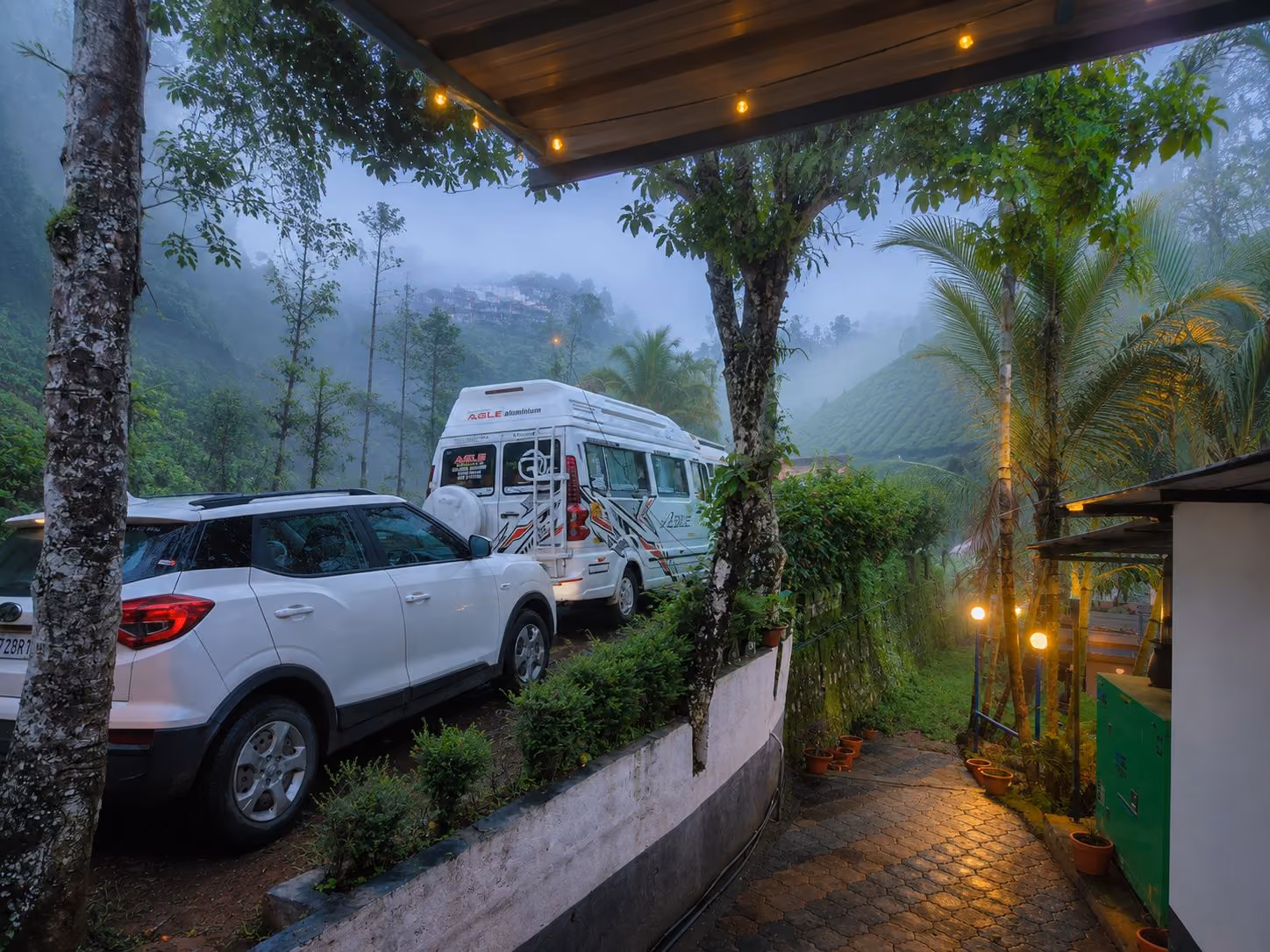 A winding mountain road through the tea plantations of Kerala
