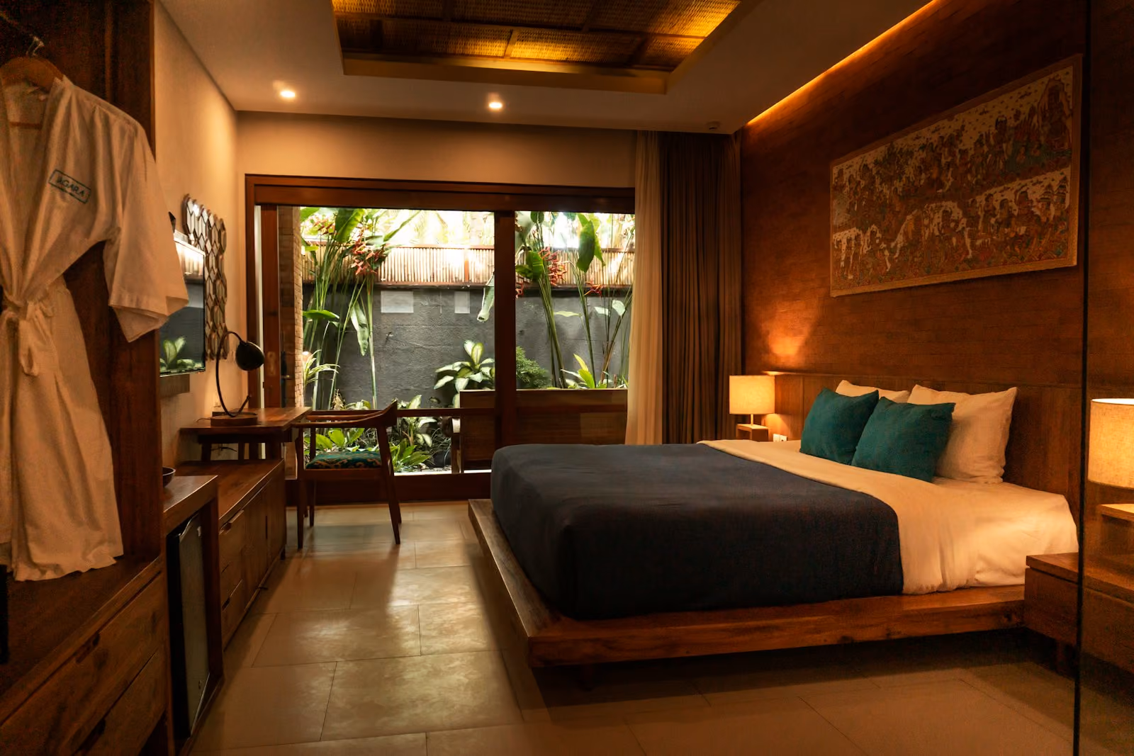 A romantic honeymoon bedroom with a wooden bed and warm light